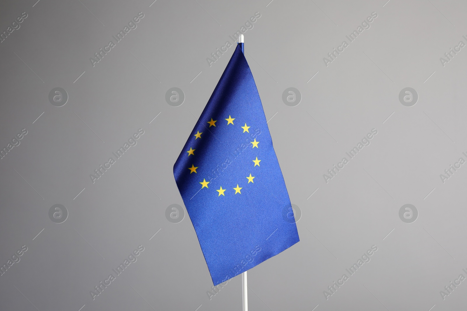 Photo of One flag of European Union on grey background