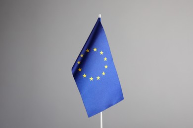 Photo of One flag of European Union on grey background