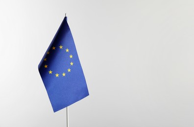 Photo of One flag of European Union on white background. Space for text