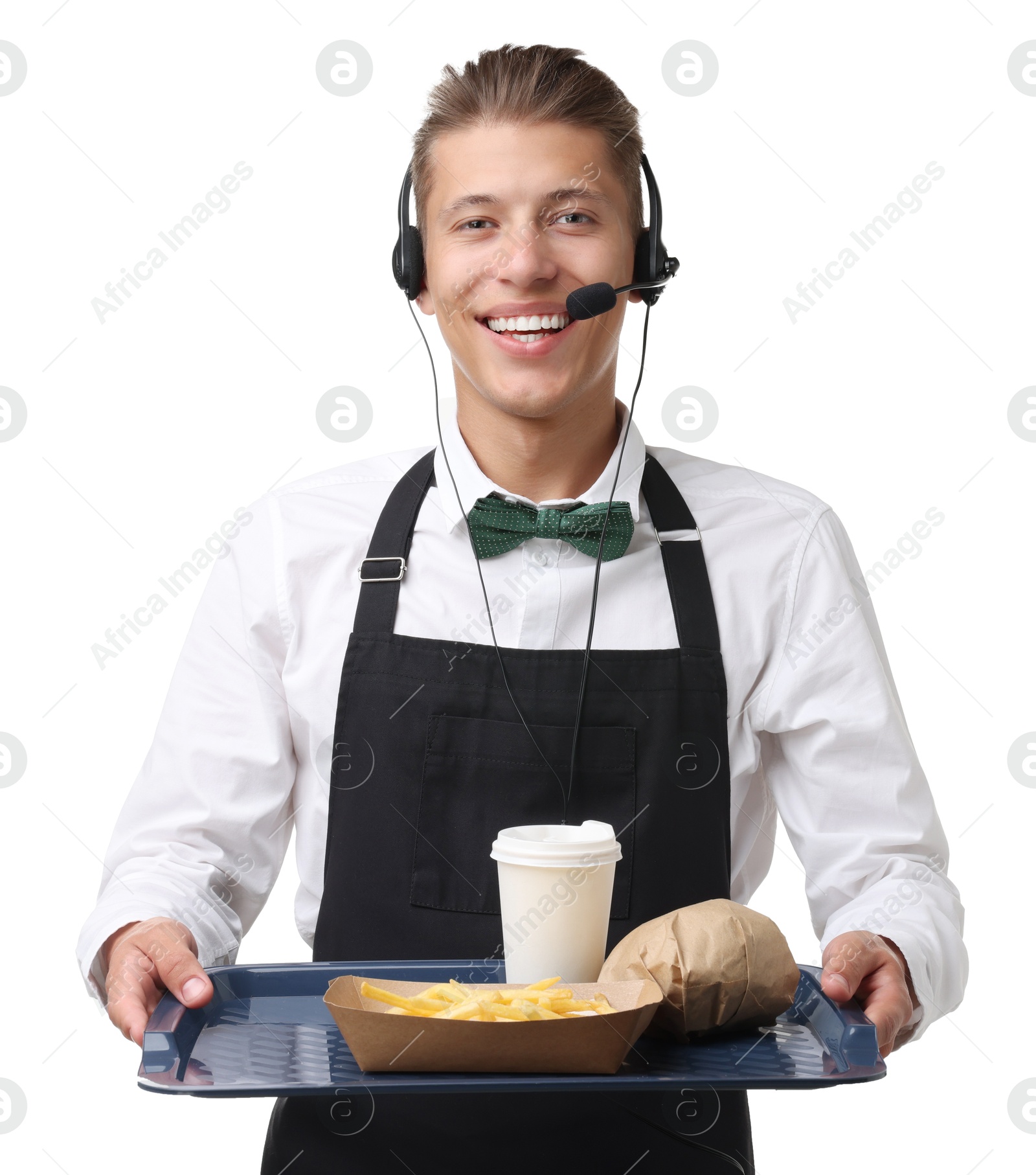 Photo of Fast-food worker holding paper container with fries and cup on white background