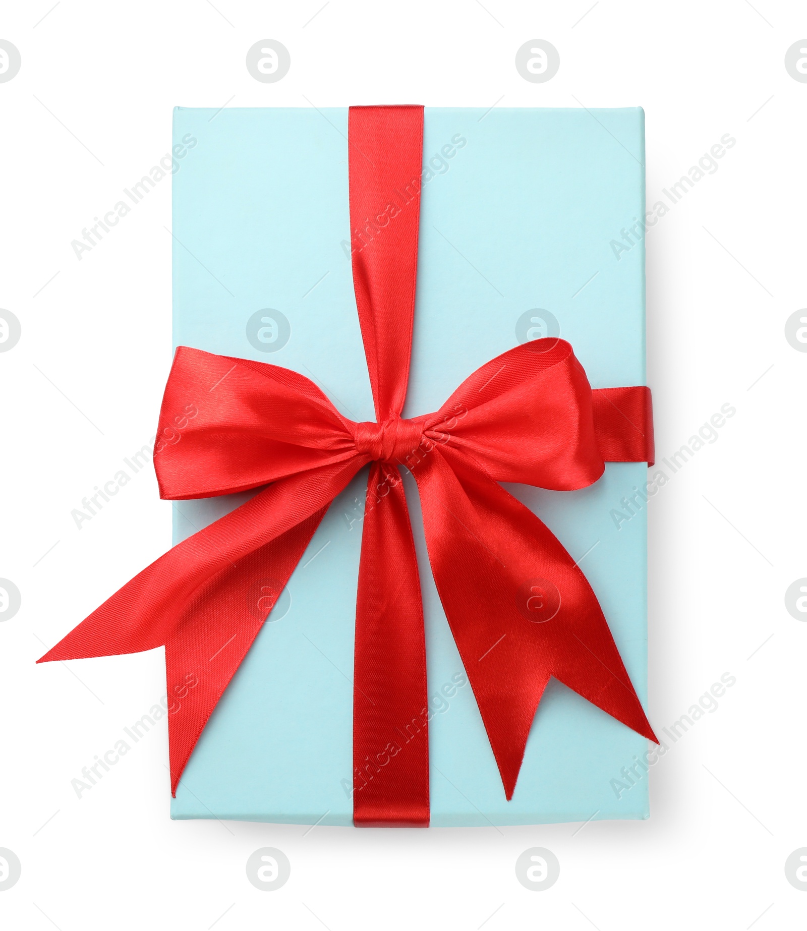 Photo of Beautiful gift box with red bow isolated on white, top view