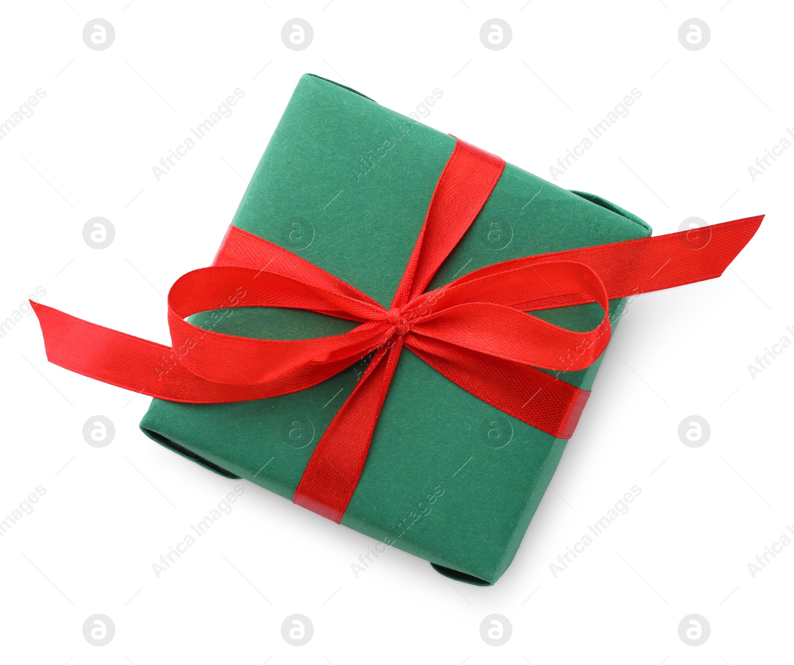 Photo of Beautiful gift box with red bow isolated on white, top view