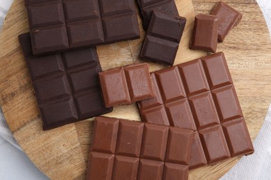 Photo of Different types of chocolate on table, top view