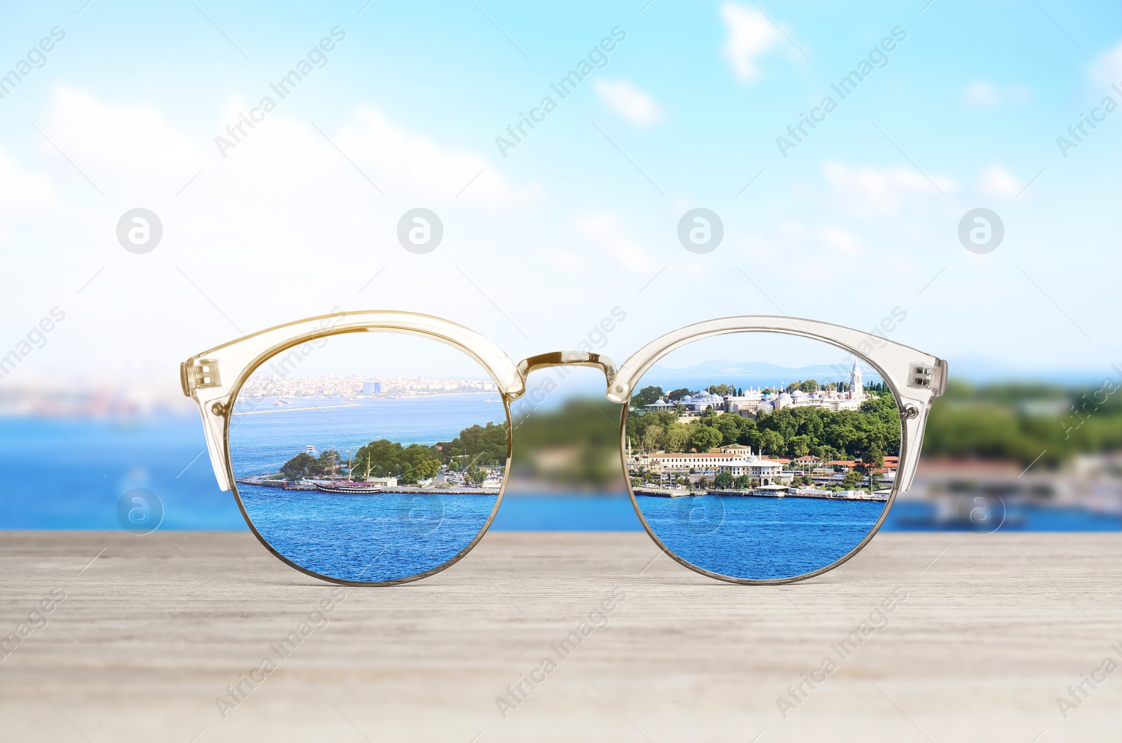 Image of Glasses against beautiful landscape. View through lenses more clear. Vision correction