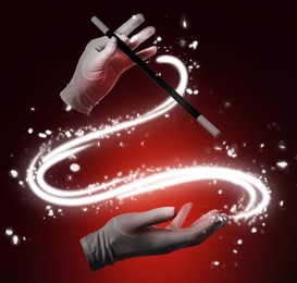 Image of Magician showing trick with magic wand on color background