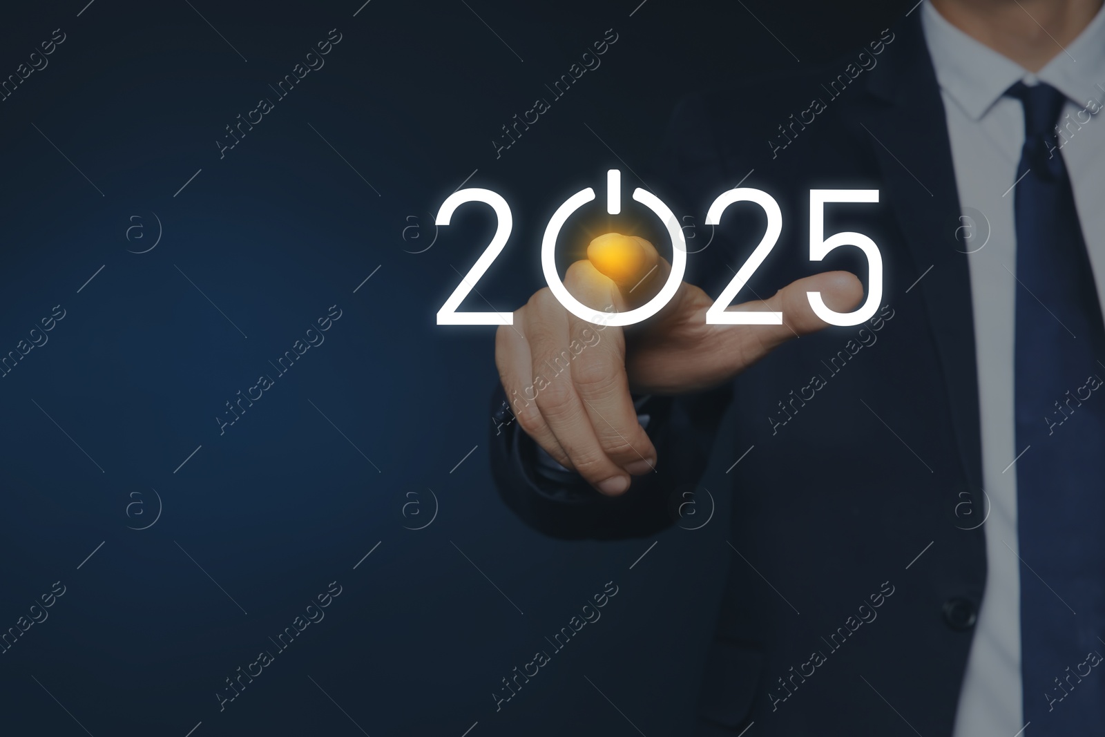 Image of New year goals. Businessman touching 2025 sign with power button instead of zero on virtual screen against dark blue background, closeup