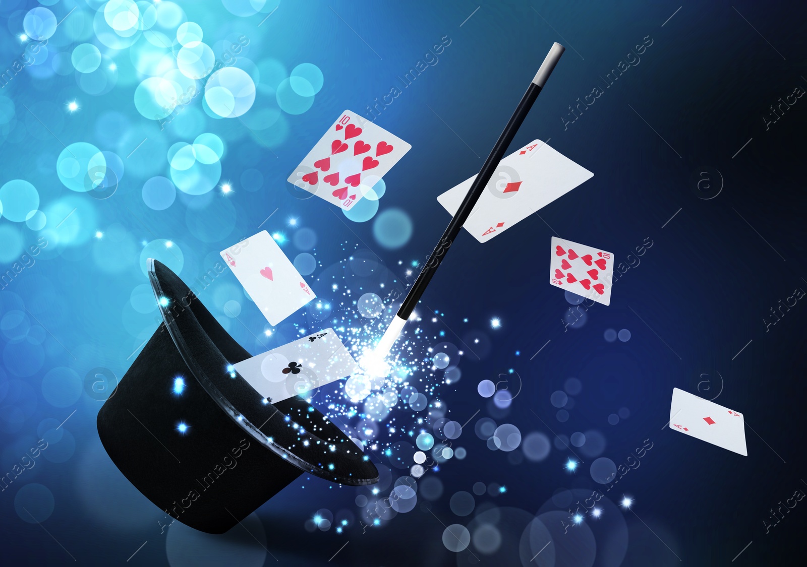 Image of Magician's hat and wand on blue background. Magic trick with playing cards