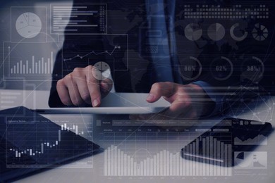 Image of Technology and business. Woman working on tablet computer at table and graphs, double exposure