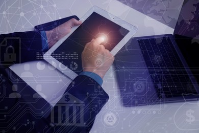 Image of Technology and business. Woman working on tablet computer at table and graphs with schemes, double exposure