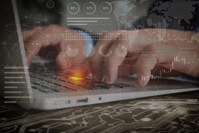 Image of Technology and business. Man working on laptop at table and graphs with schemes, double exposure