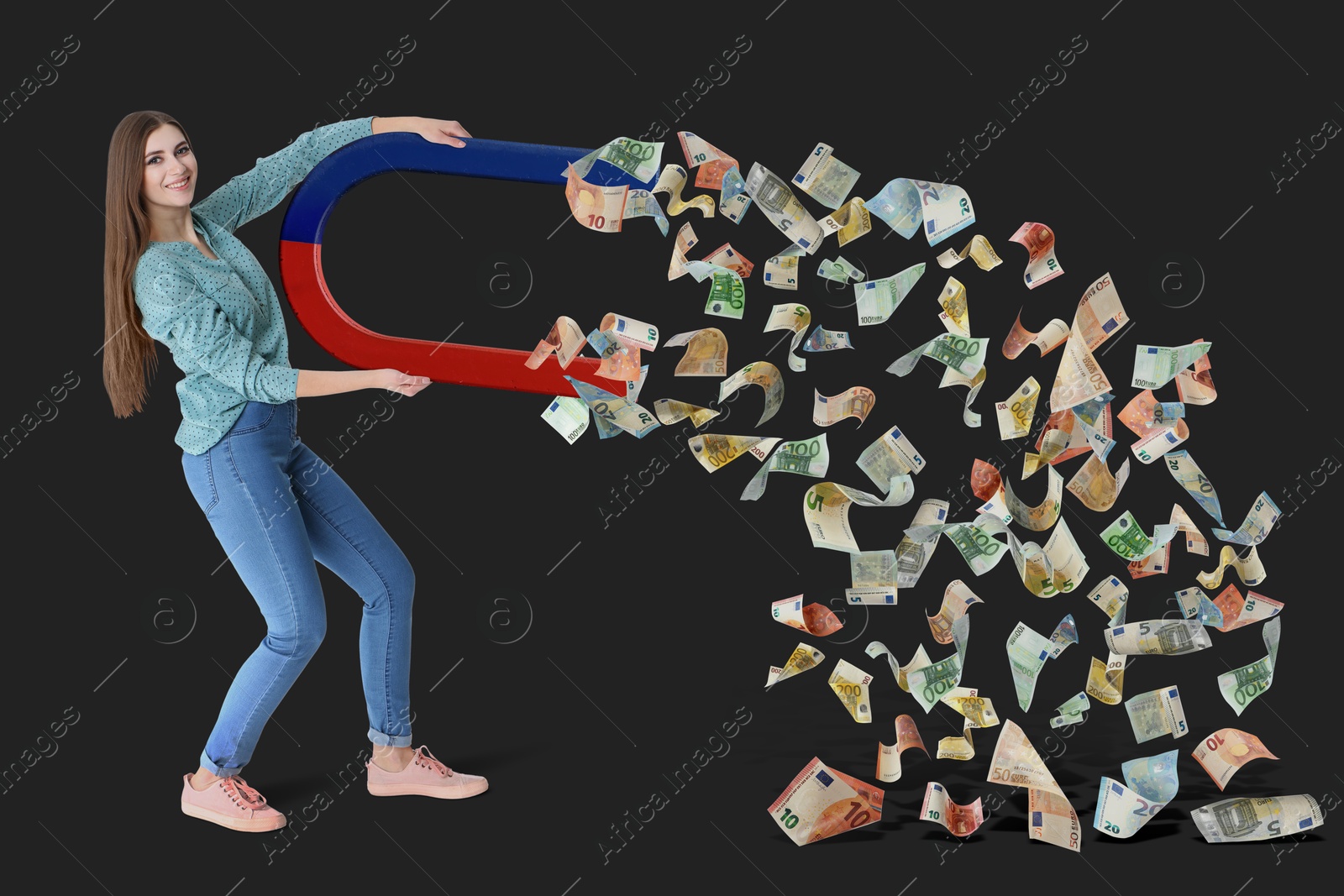 Image of Happy woman attracting euro bills with magnet on black background. Concept of money earning