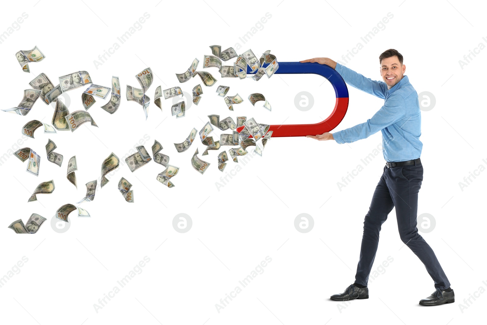 Image of Happy man attracting dollar bills with magnet on white background. Concept of money earning