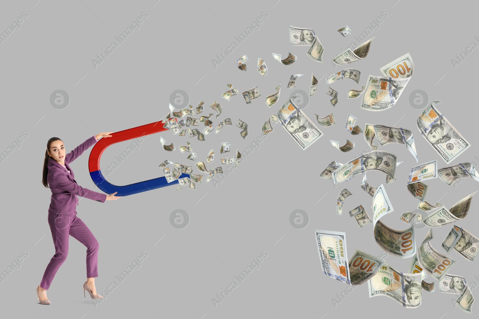 Image of Businesswoman attracting dollar bills with magnet on light grey background. Concept of money earning