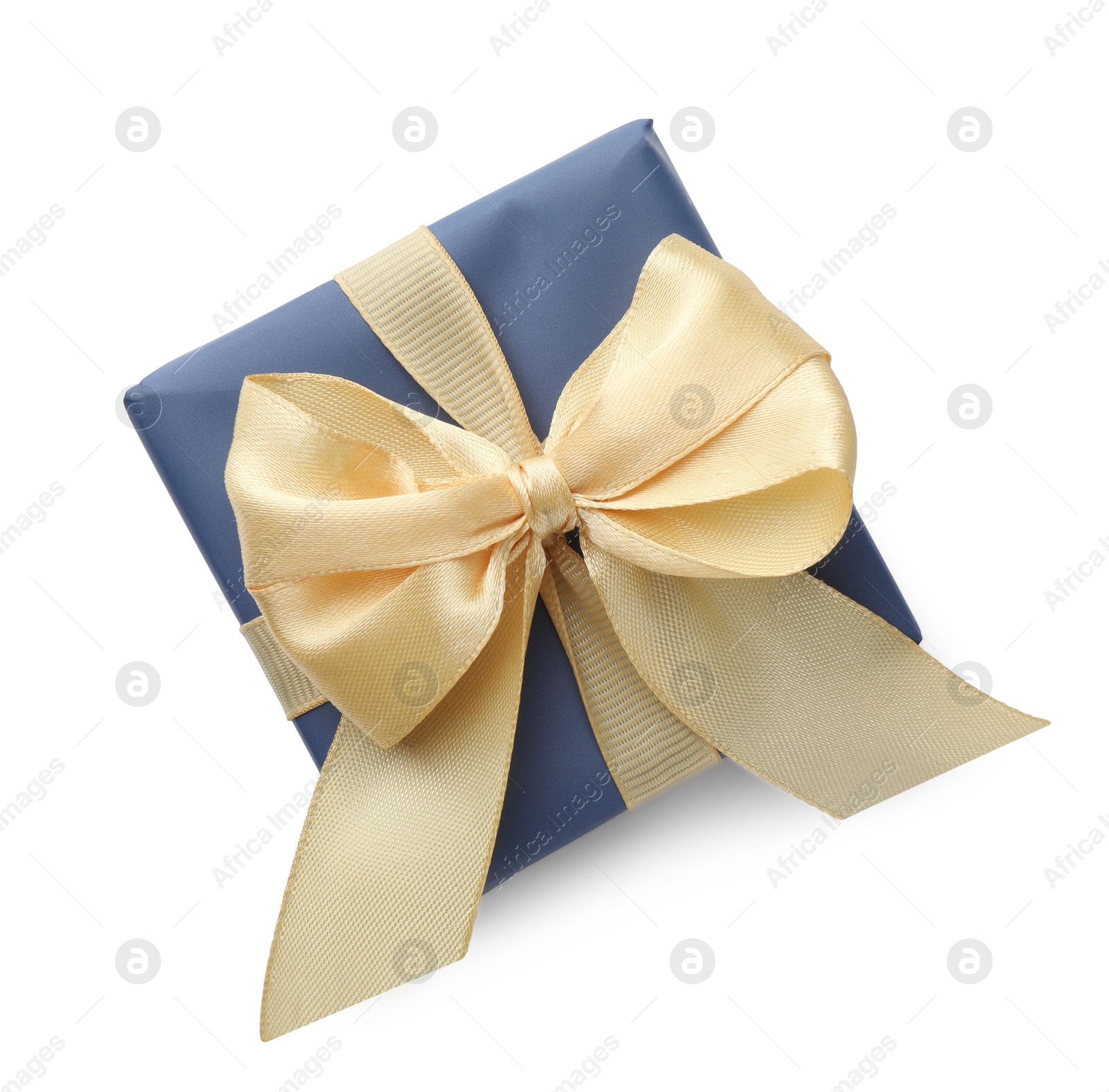 Photo of Beautiful gift box with golden bow isolated on white, top view