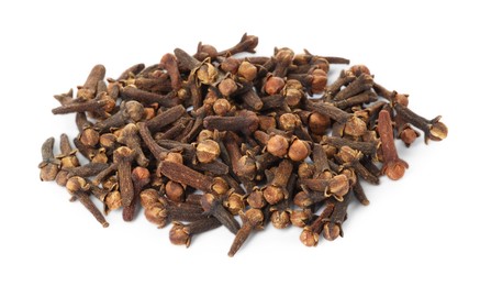 Photo of Pile of dry clove buds on white background. Aromatic spice