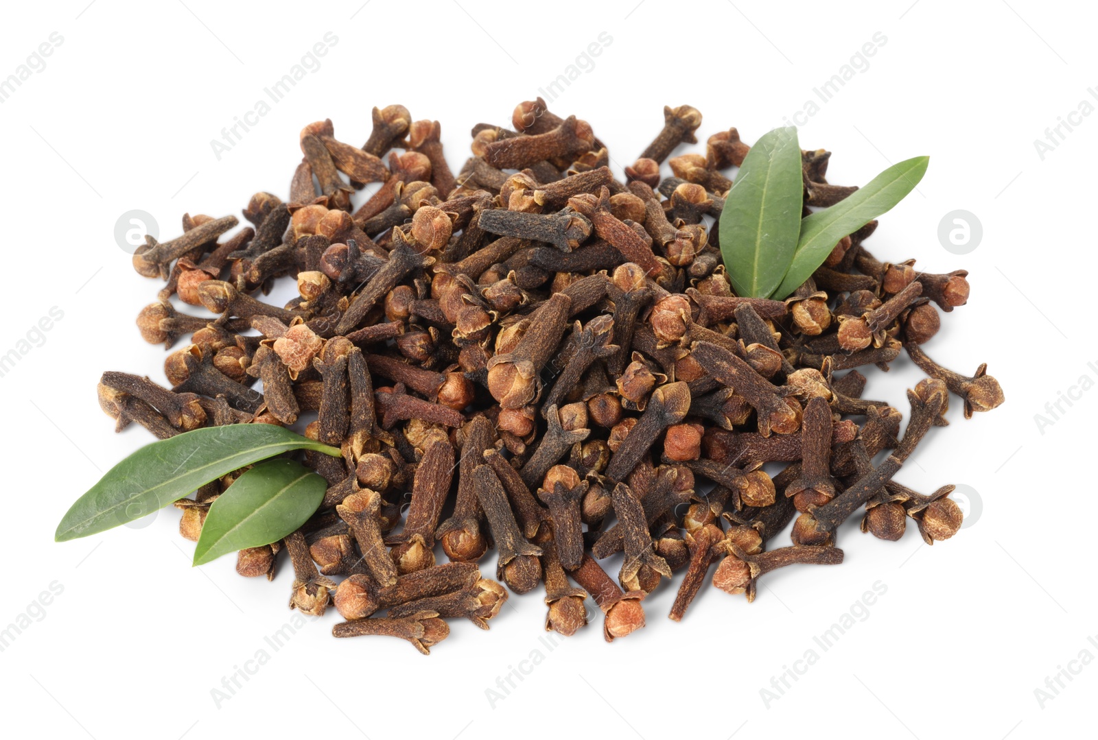 Photo of Pile of dry clove buds and green leaves on white background. Aromatic spice