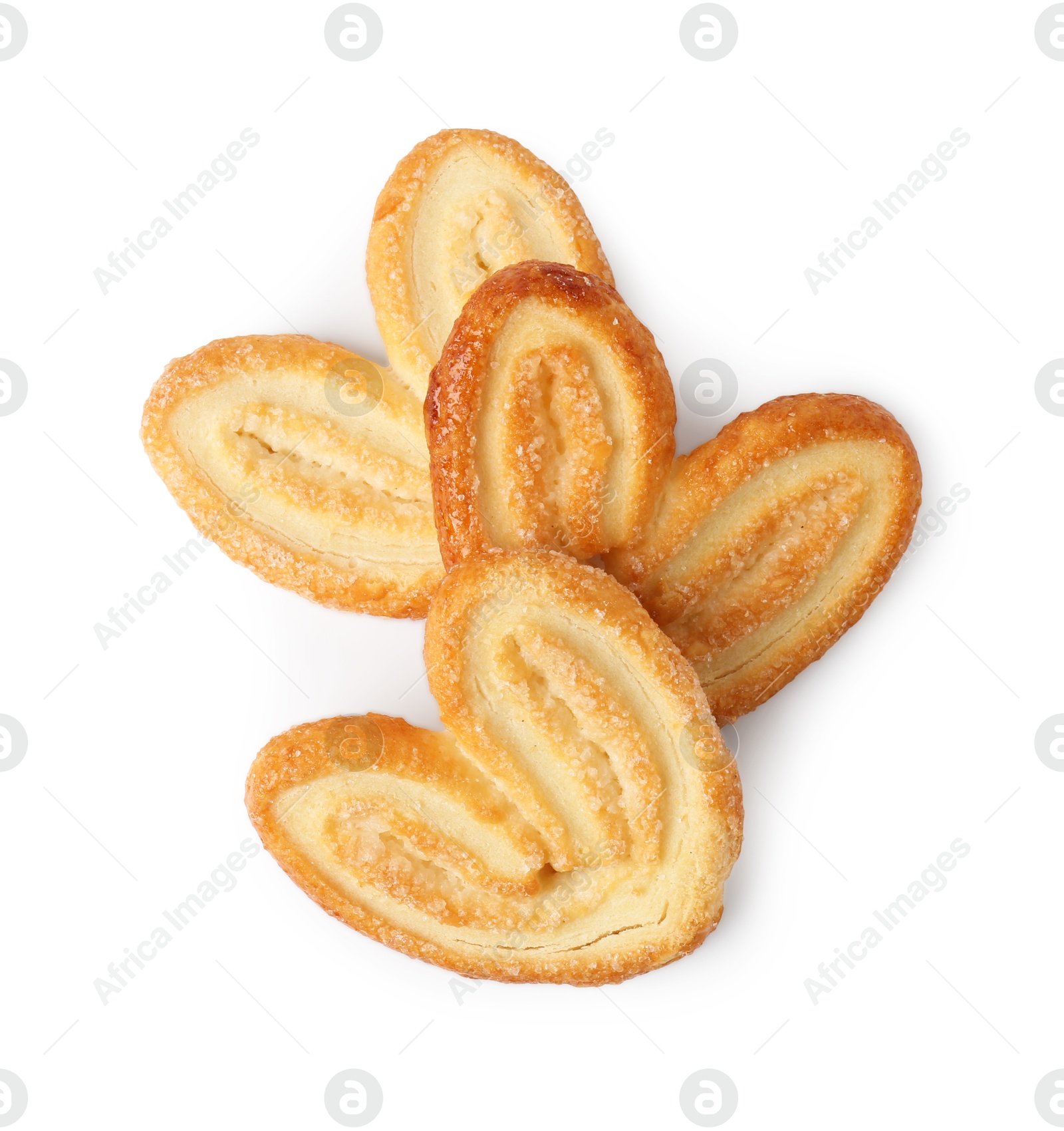 Photo of Tasty french palmier cookies isolated on white, top view