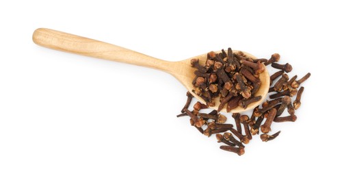 Photo of Dry clove buds in wooden spoon on white background, top view. Aromatic spice