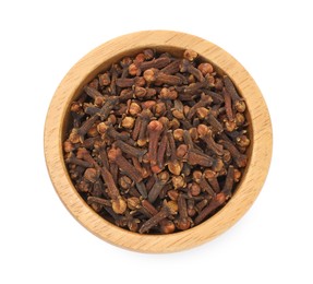 Photo of Dry clove buds in wooden bowl on white background, top view. Aromatic spice