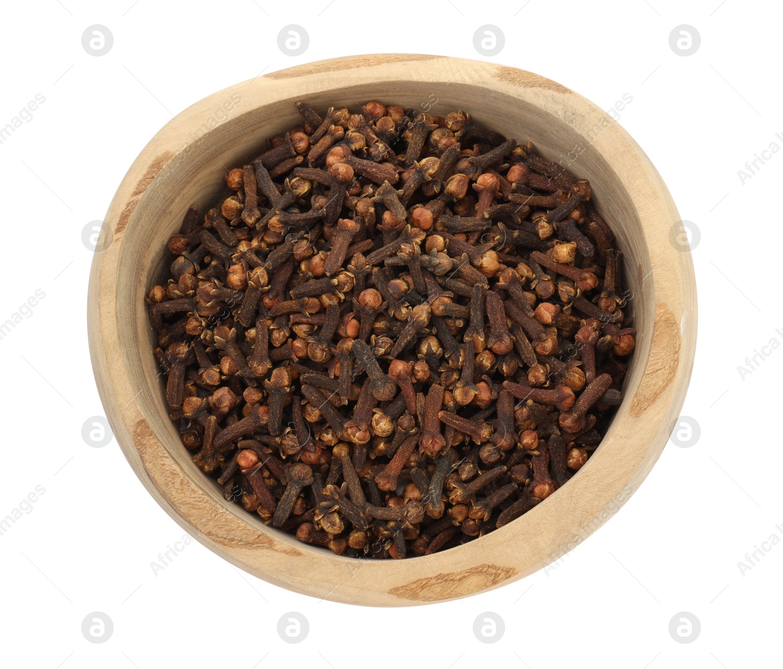 Photo of Dry clove buds in wooden bowl on white background, top view. Aromatic spice