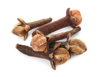 Photo of Dry clove buds on white background. Aromatic spice