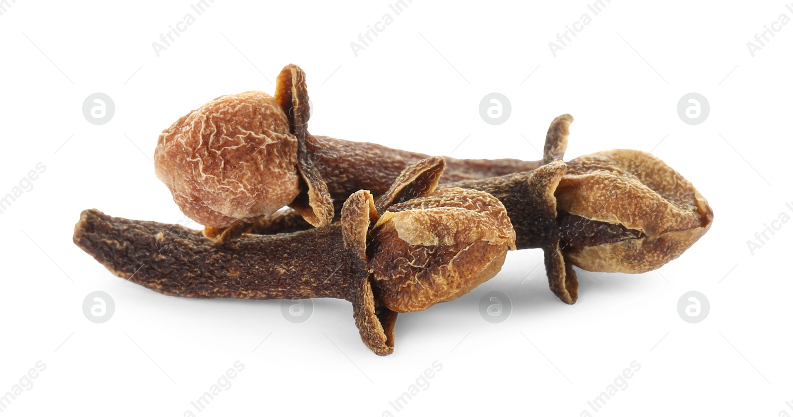 Photo of Dry clove buds on white background. Aromatic spice