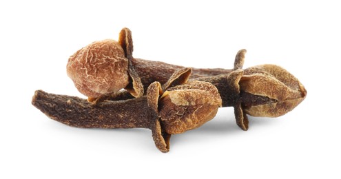 Photo of Dry clove buds on white background. Aromatic spice