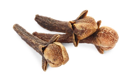 Dry clove buds on white background. Aromatic spice