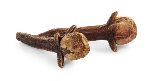 Dry clove buds on white background. Aromatic spice