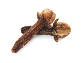 Photo of Dry clove buds on white background. Aromatic spice