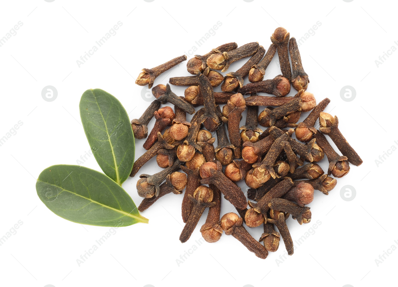 Photo of Dry clove buds and green leaves on white background, top view. Aromatic spice