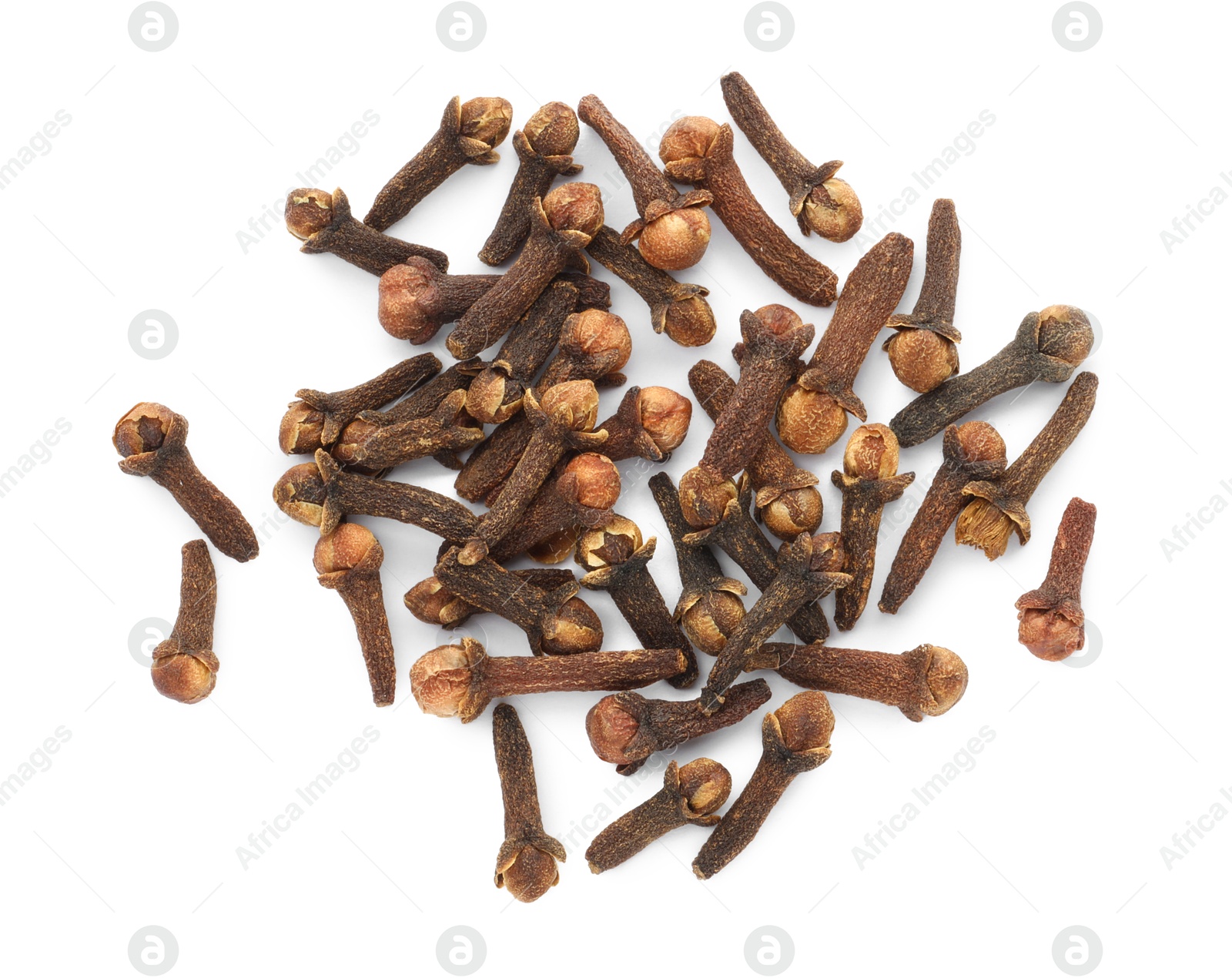 Photo of Pile of dry clove buds on white background, top view. Aromatic spice