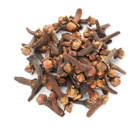 Pile of dry clove buds on white background, top view. Aromatic spice