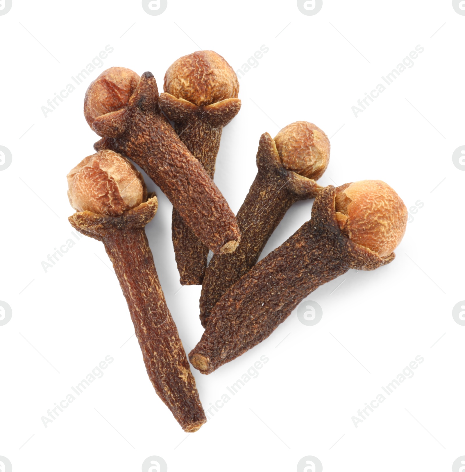 Photo of Dry clove buds on white background, top view. Aromatic spice