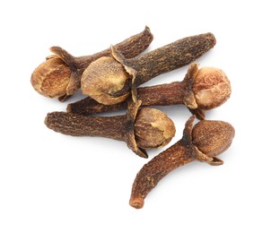 Dry clove buds on white background, top view. Aromatic spice