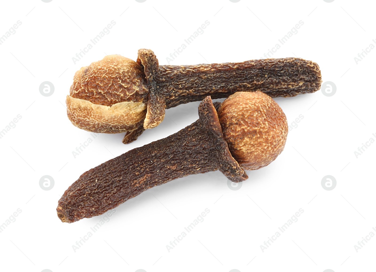 Photo of Dry clove buds on white background, top view. Aromatic spice