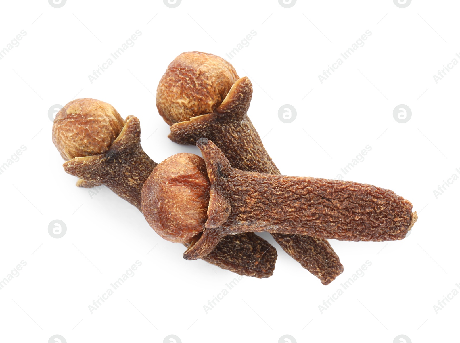 Photo of Dry clove buds on white background, top view. Aromatic spice