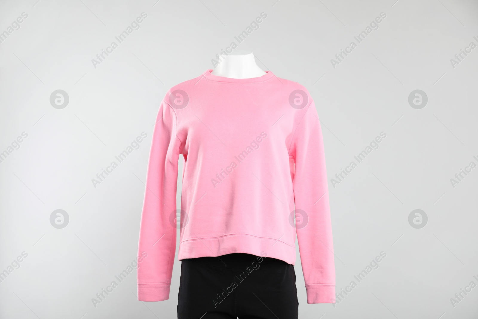 Photo of Female mannequin with stylish outfit on light background