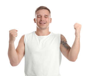 Photo of Portrait of happy winner on white background