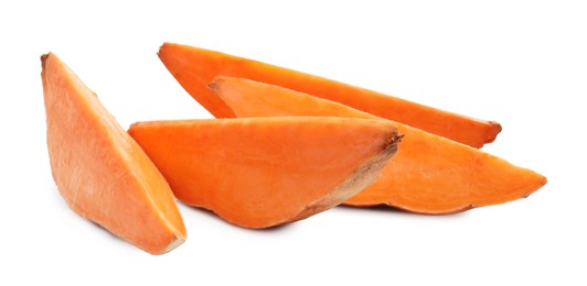 Photo of Pieces of raw sweet potato isolated on white