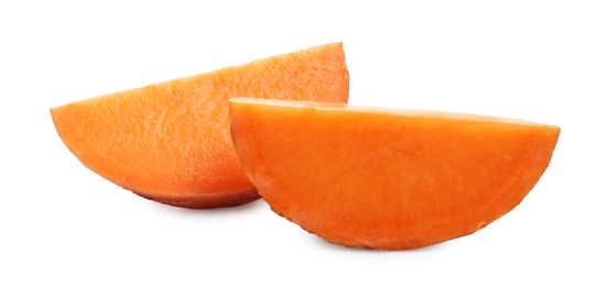 Photo of Pieces of raw sweet potato isolated on white