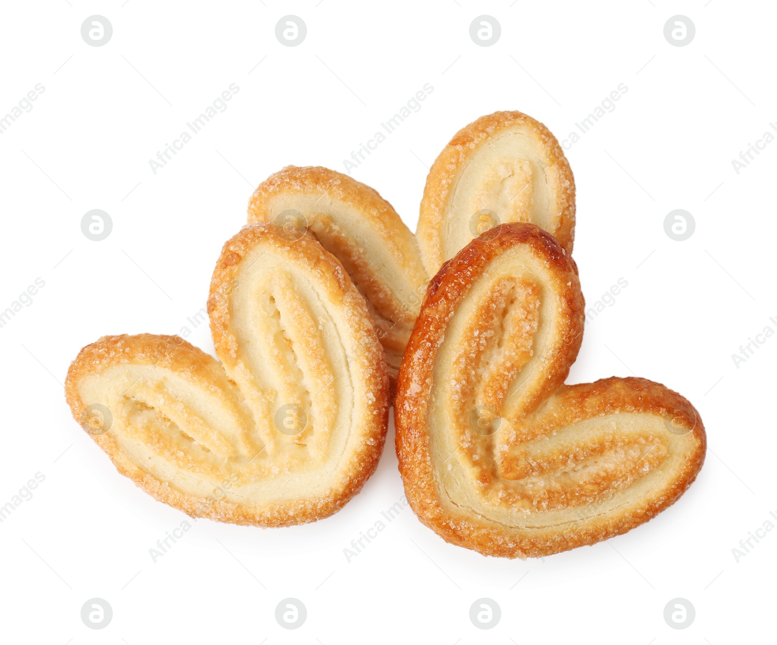 Photo of Tasty french palmier cookies isolated on white, top view