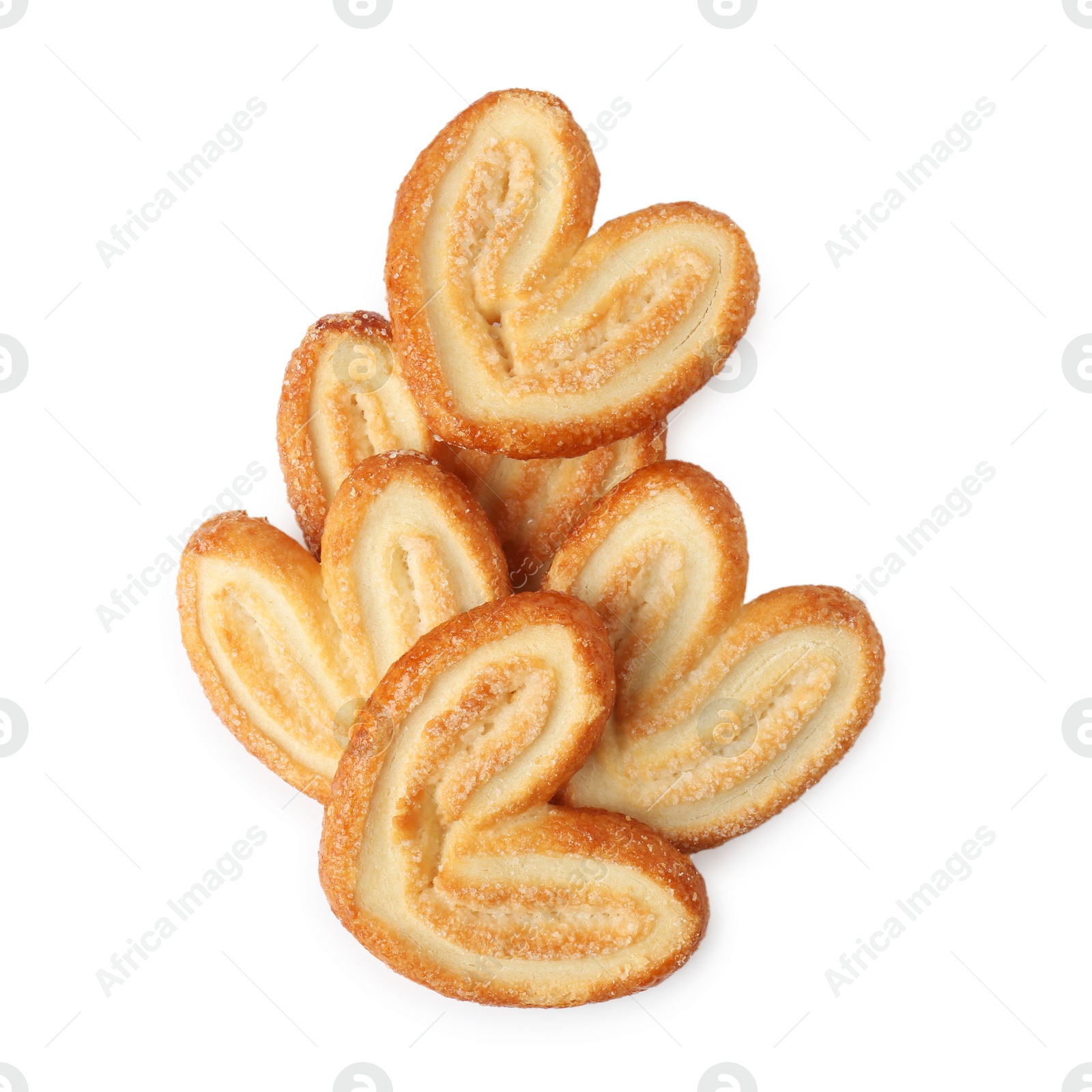 Photo of Tasty french palmier cookies isolated on white, top view