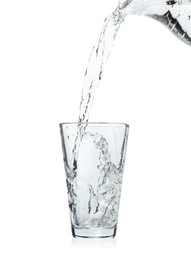 Photo of Pouring soda water from jug into glass on white background