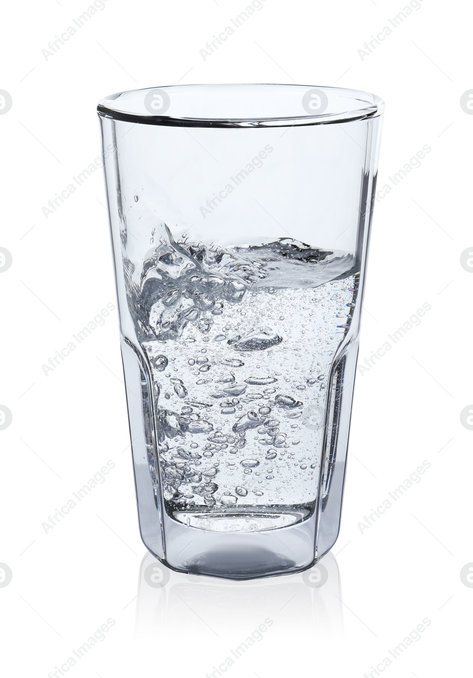 Photo of Pouring soda water from bottle into glass on white background