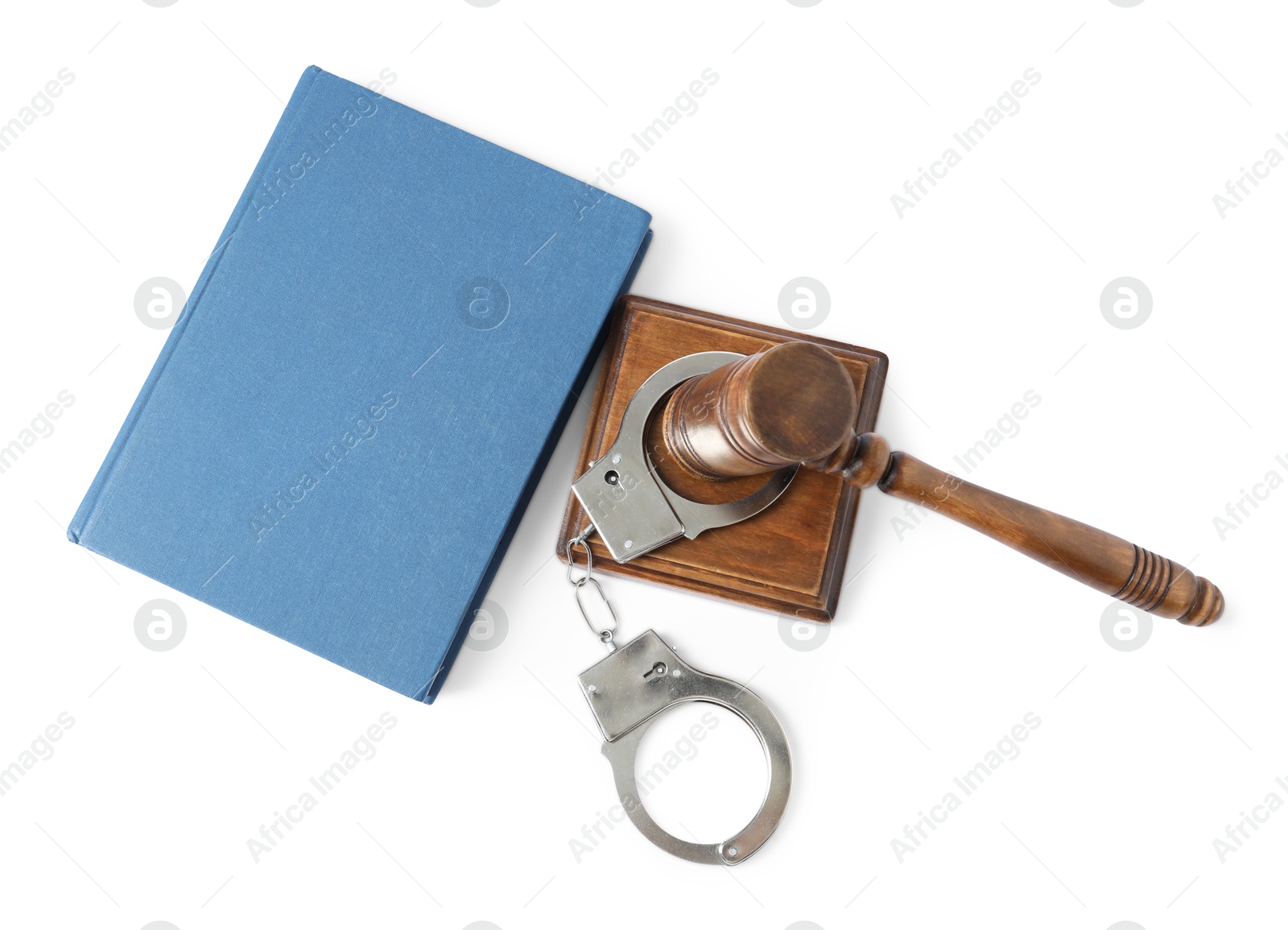 Photo of Handcuffs, judge's gavel and book isolated on white, top view