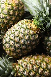 Photo of Fresh ripe pineapples as background, closeup view