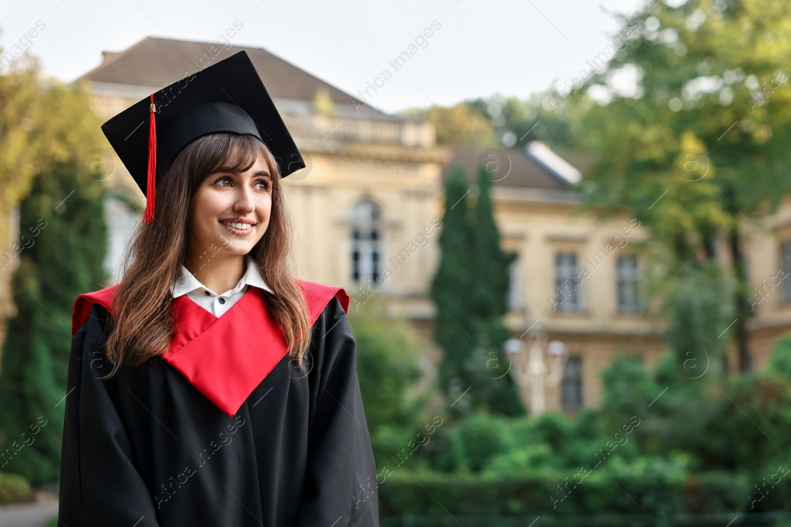 Photo of Graduation ceremony. Happy student outdoors, space for text