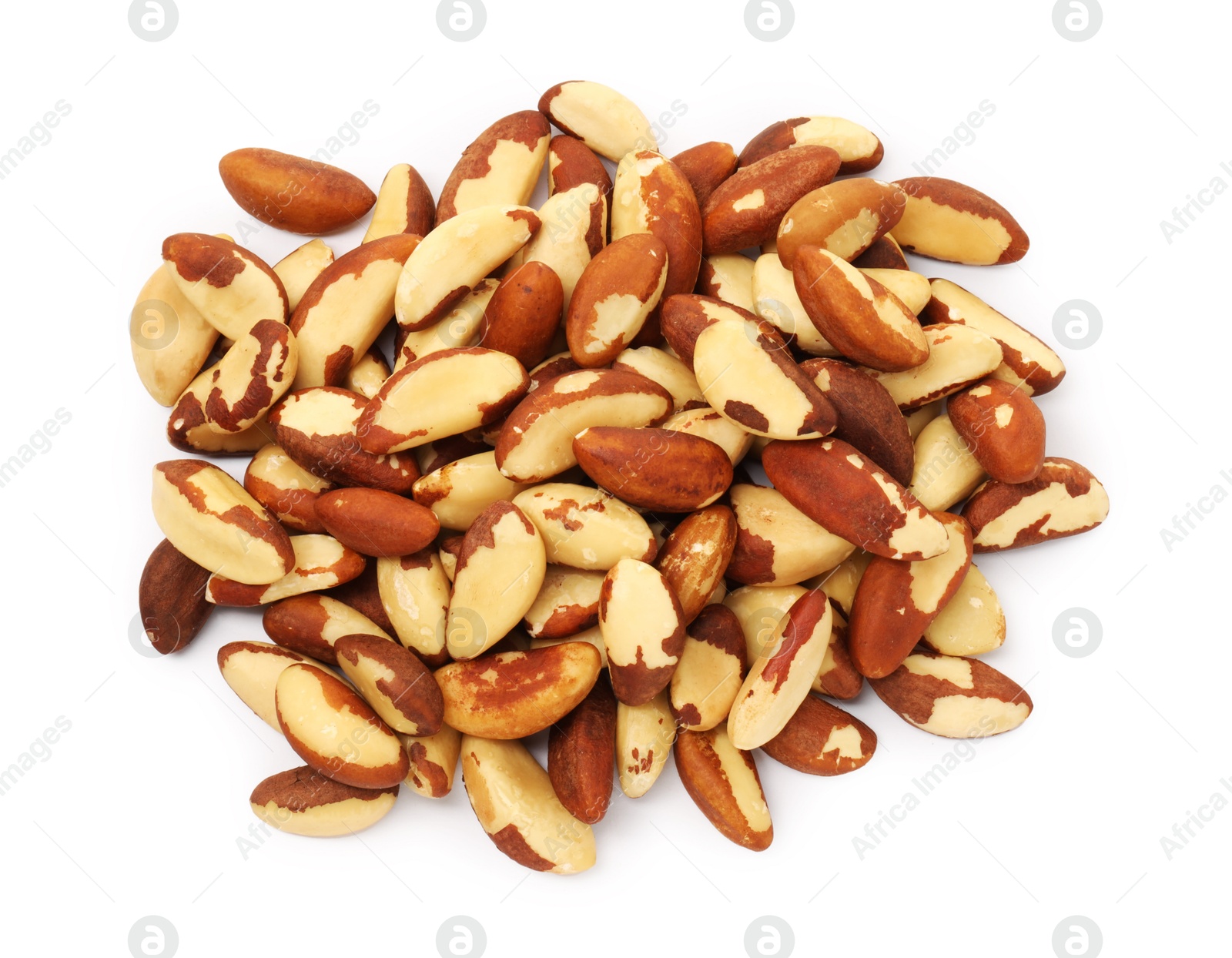 Photo of Heap of Brazil nuts isolated on white, top view