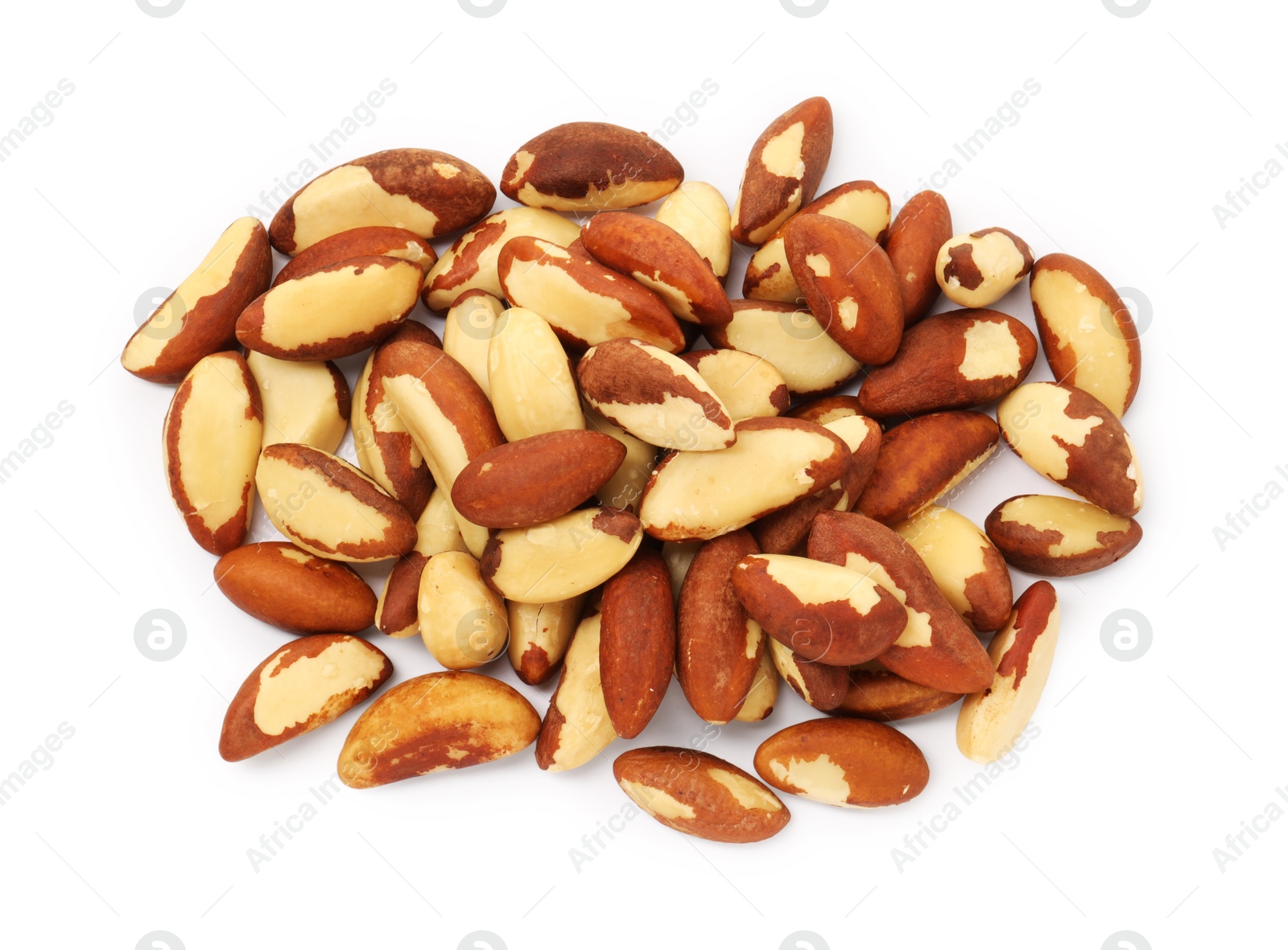 Photo of Heap of Brazil nuts isolated on white, top view